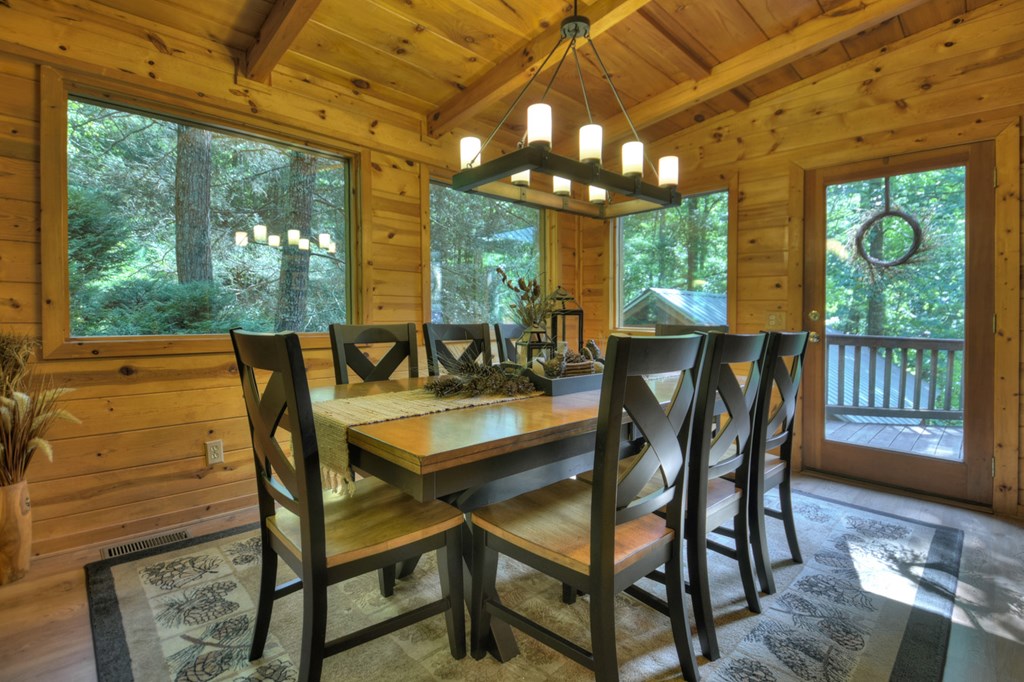 91 Dream Cove Road Cherry Log, GA 30522 - Photo 14 of 83 a view of a dining room with furniture window and outside view