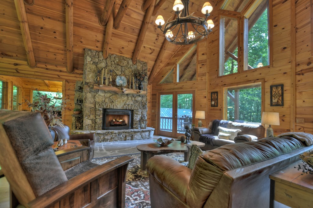 91 Dream Cove Road Cherry Log, GA 30522 - Photo 21 of 83 a living room with furniture and a fireplace