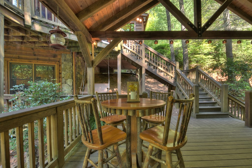 91 Dream Cove Road Cherry Log, GA 30522 - Photo 37 of 83 a view of an chairs and table in the balcony