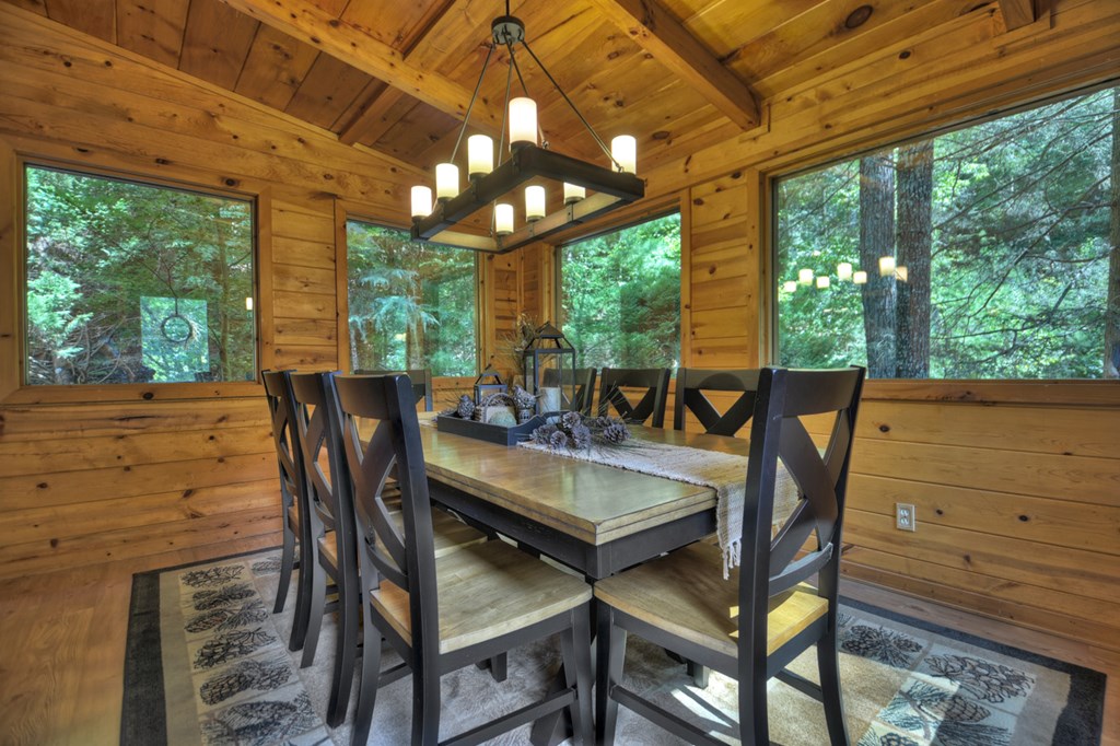 91 Dream Cove Road Cherry Log, GA 30522 - Photo 39 of 83 a view of a dining room with furniture window and outside view
