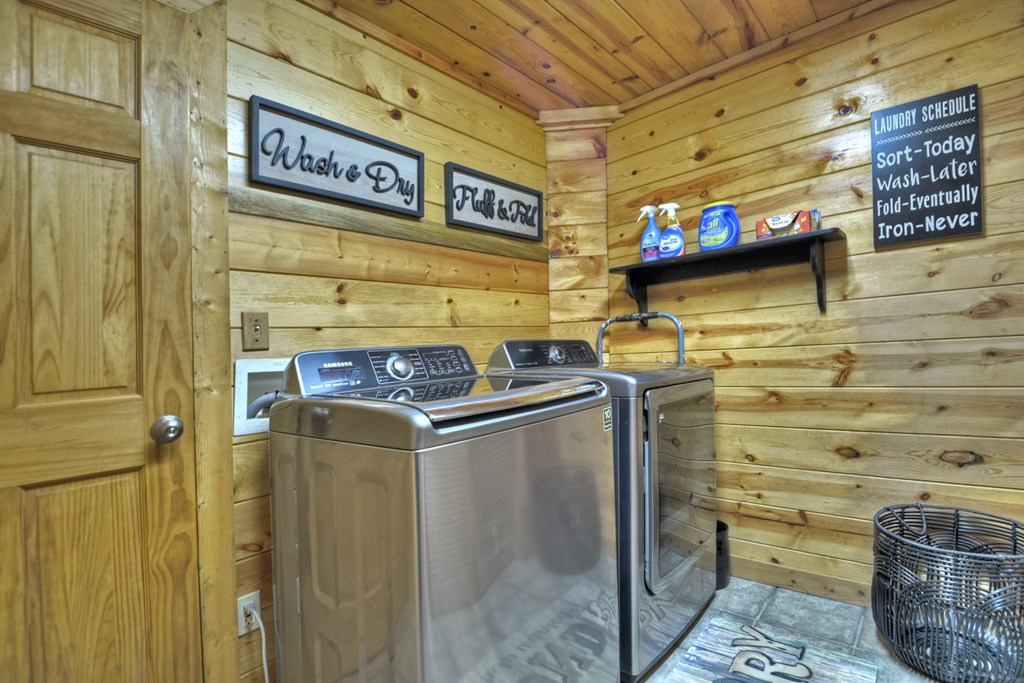 91 Dream Cove Road Cherry Log, GA 30522 - Photo 59 of 83 a utility room with stainless steel appliances kitchen island granite countertop a stove and a refrigerator