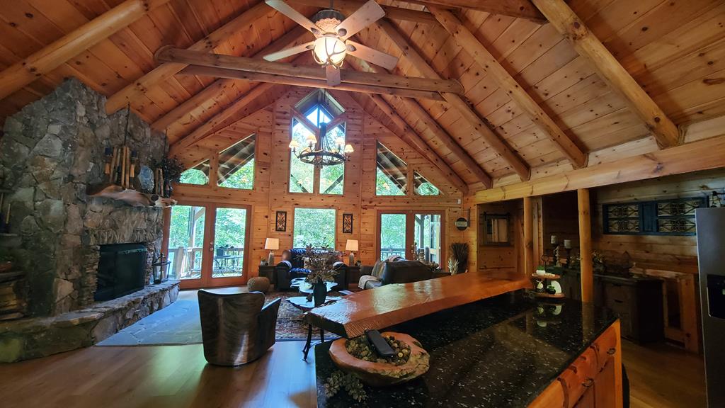 91 Dream Cove Road Cherry Log, GA 30522 - Photo 64 of 83 a room with furniture and a fireplace