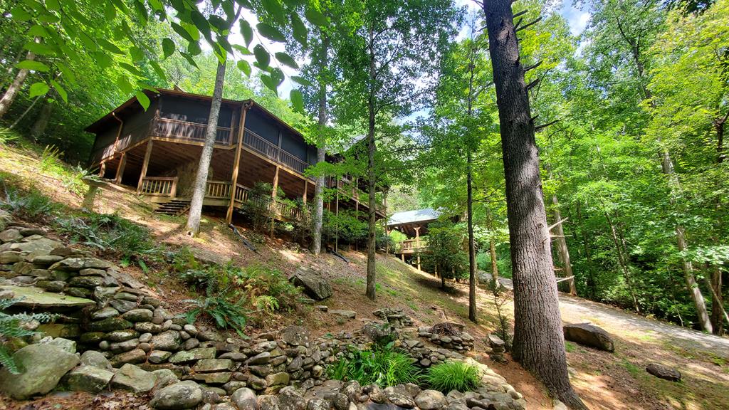 91 Dream Cove Road Cherry Log, GA 30522 - Photo 83 of 83 a view of a wooden house with a yard