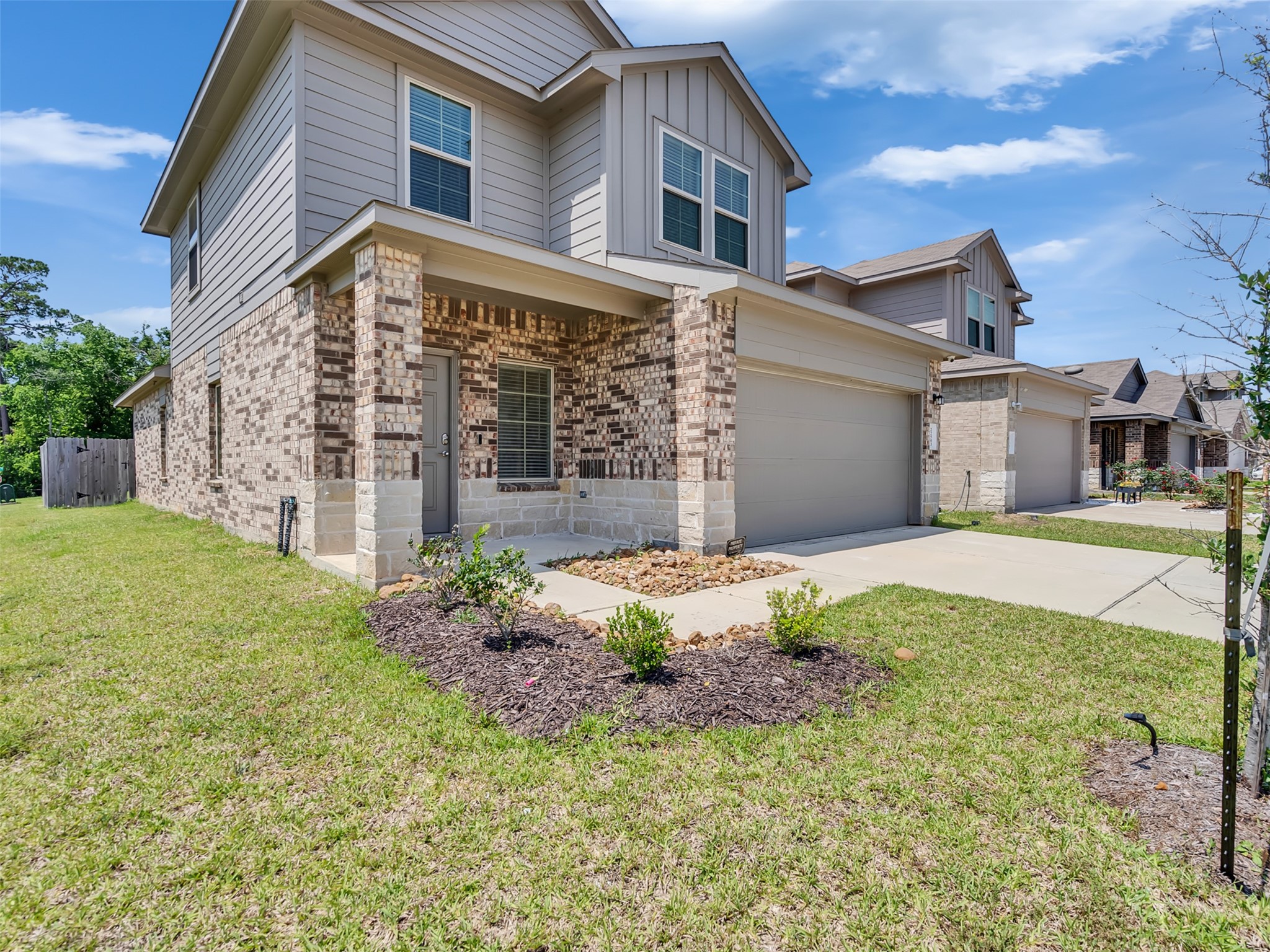 22503 Aspen Tarn Trail Spring, TX 77373 - Photo 3 of 30 a front view of a house with garden