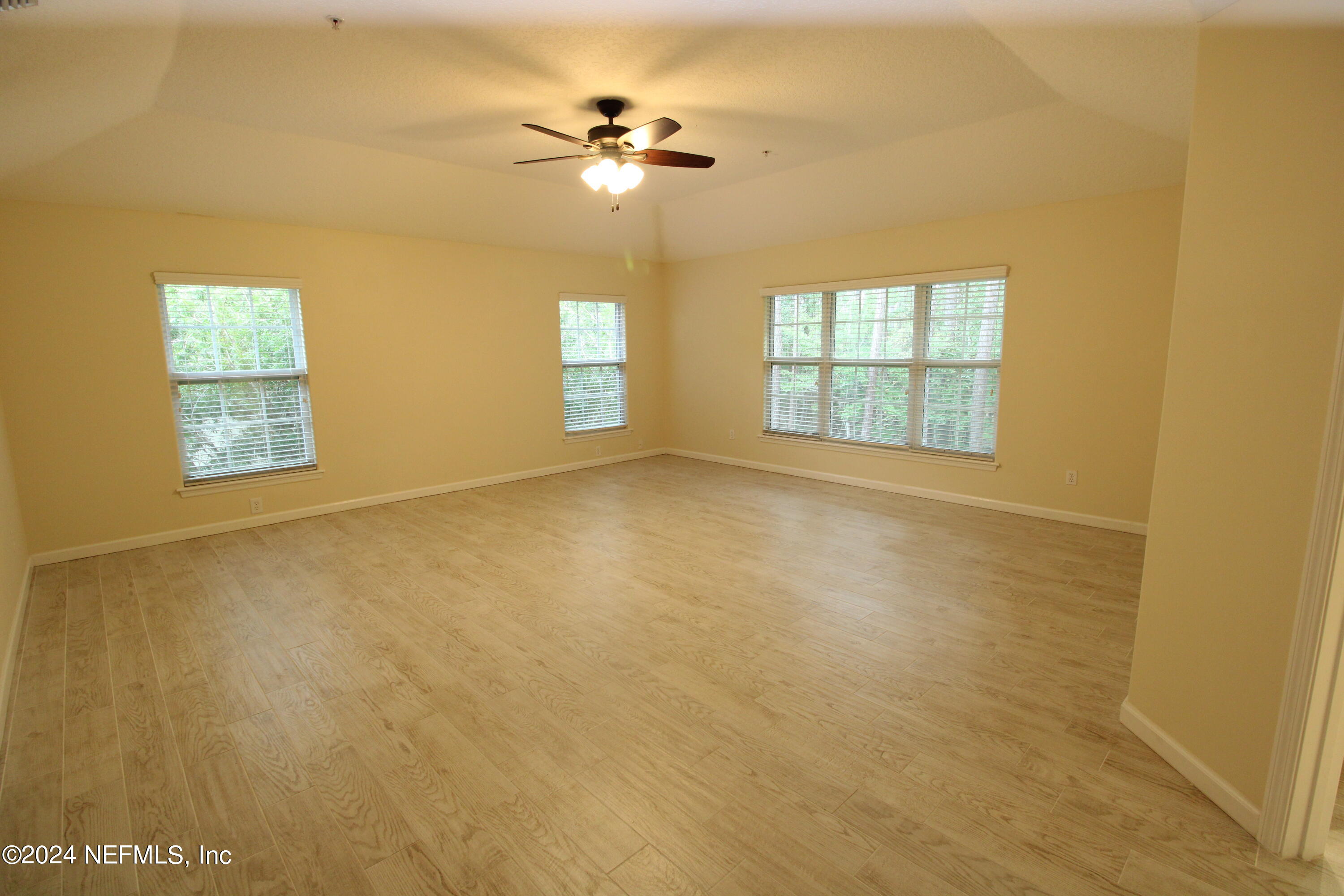 28 Grand Ravine Drive St. Augustine, FL 32086 - Photo 21 of 55 a view of an empty room with a window