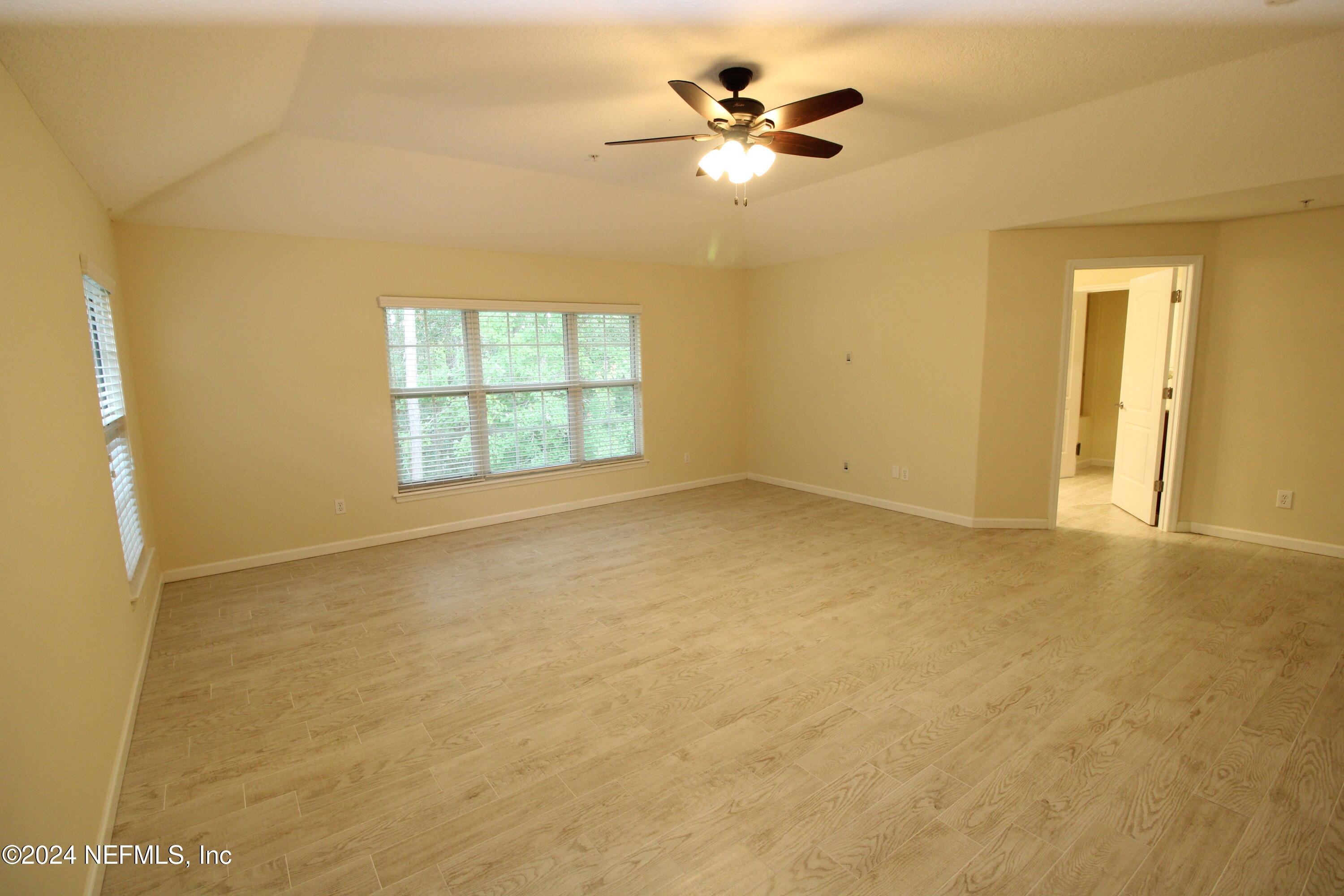 28 Grand Ravine Drive St. Augustine, FL 32086 - Photo 23 of 55 a view of an empty room with a window