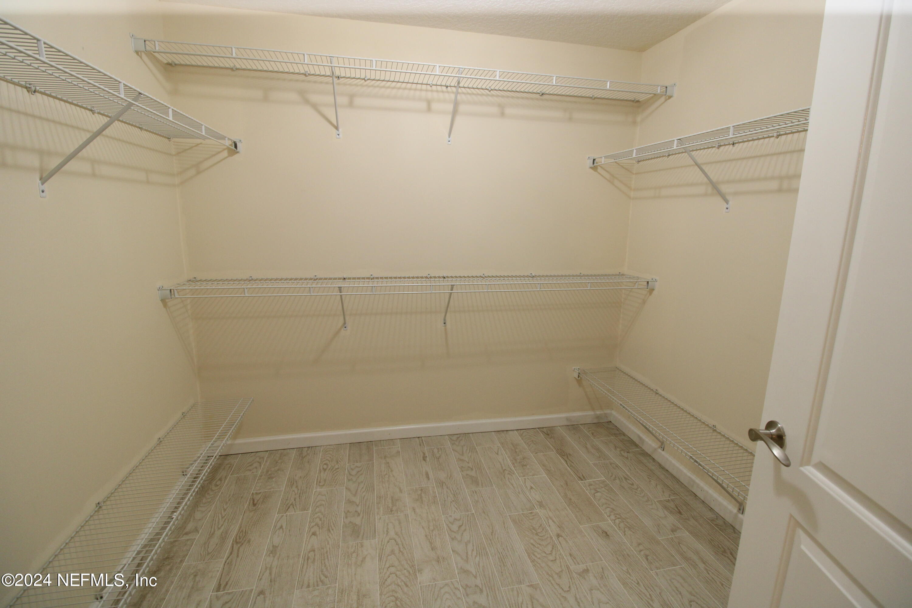 28 Grand Ravine Drive St. Augustine, FL 32086 - Photo 29 of 55 a view of a room with racks on the wall