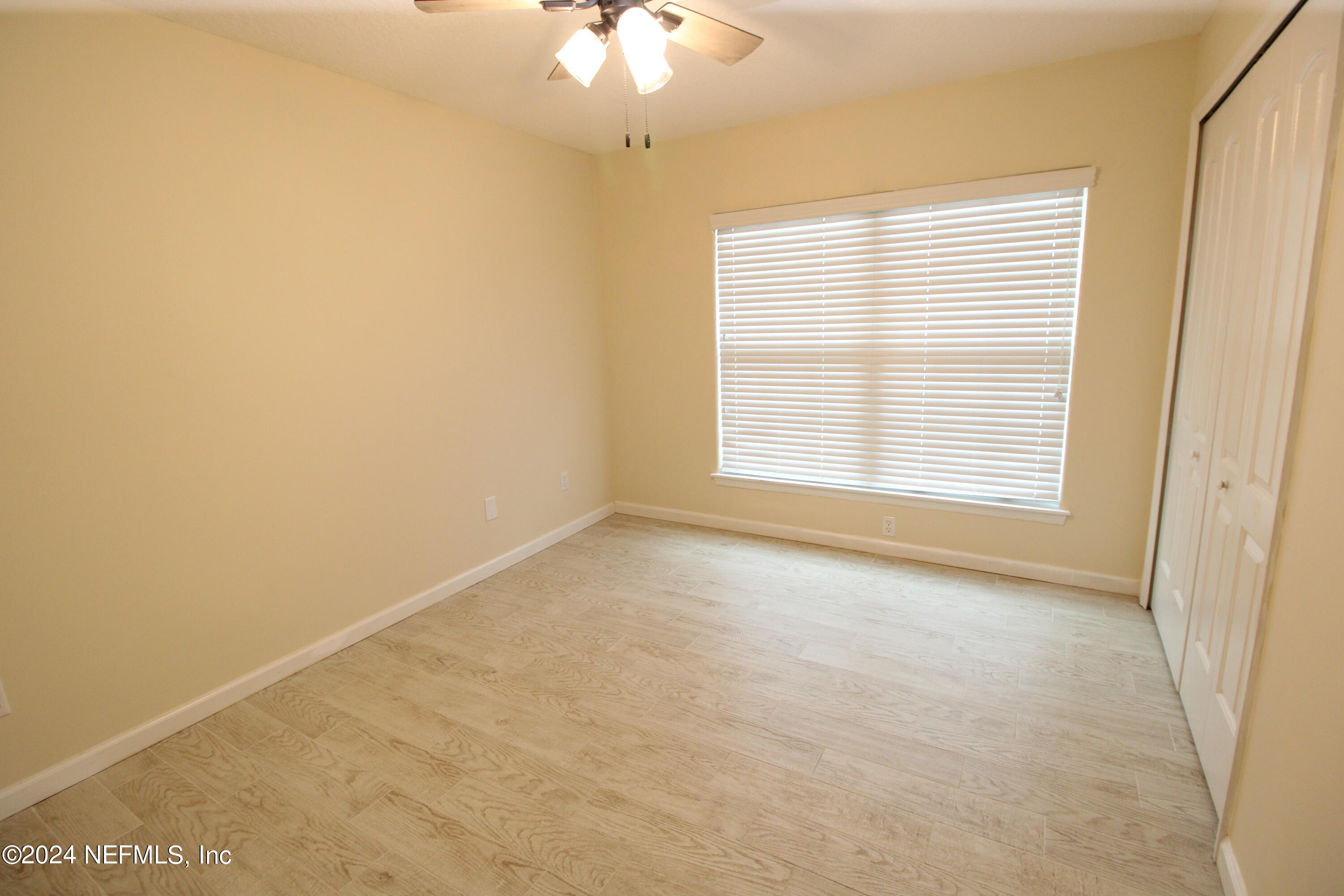 28 Grand Ravine Drive St. Augustine, FL 32086 - Photo 31 of 55 an empty room with a window