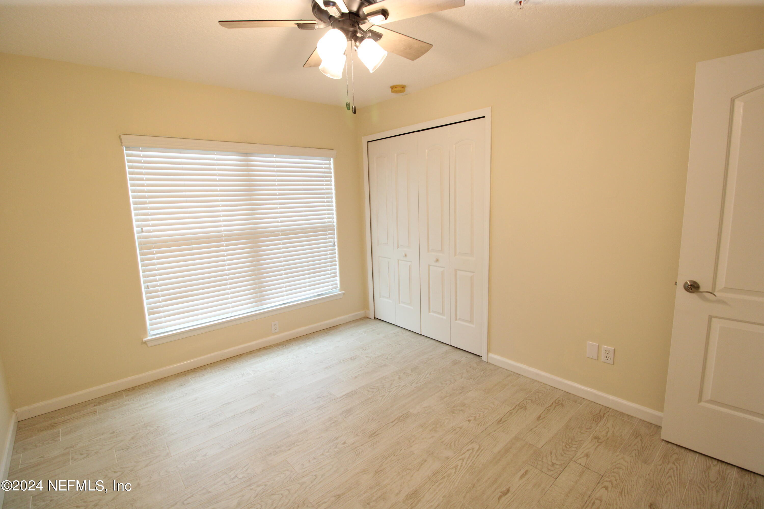 28 Grand Ravine Drive St. Augustine, FL 32086 - Photo 33 of 55 a view of an empty room with a window