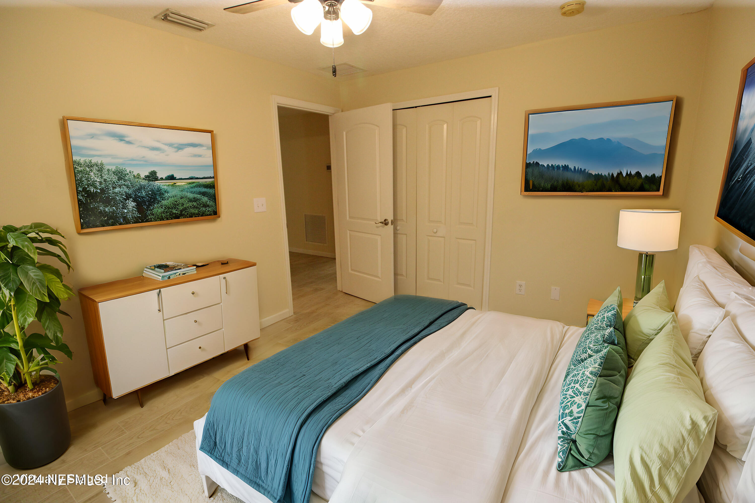 28 Grand Ravine Drive St. Augustine, FL 32086 - Photo 35 of 55 a bedroom with a bed and a flat screen tv