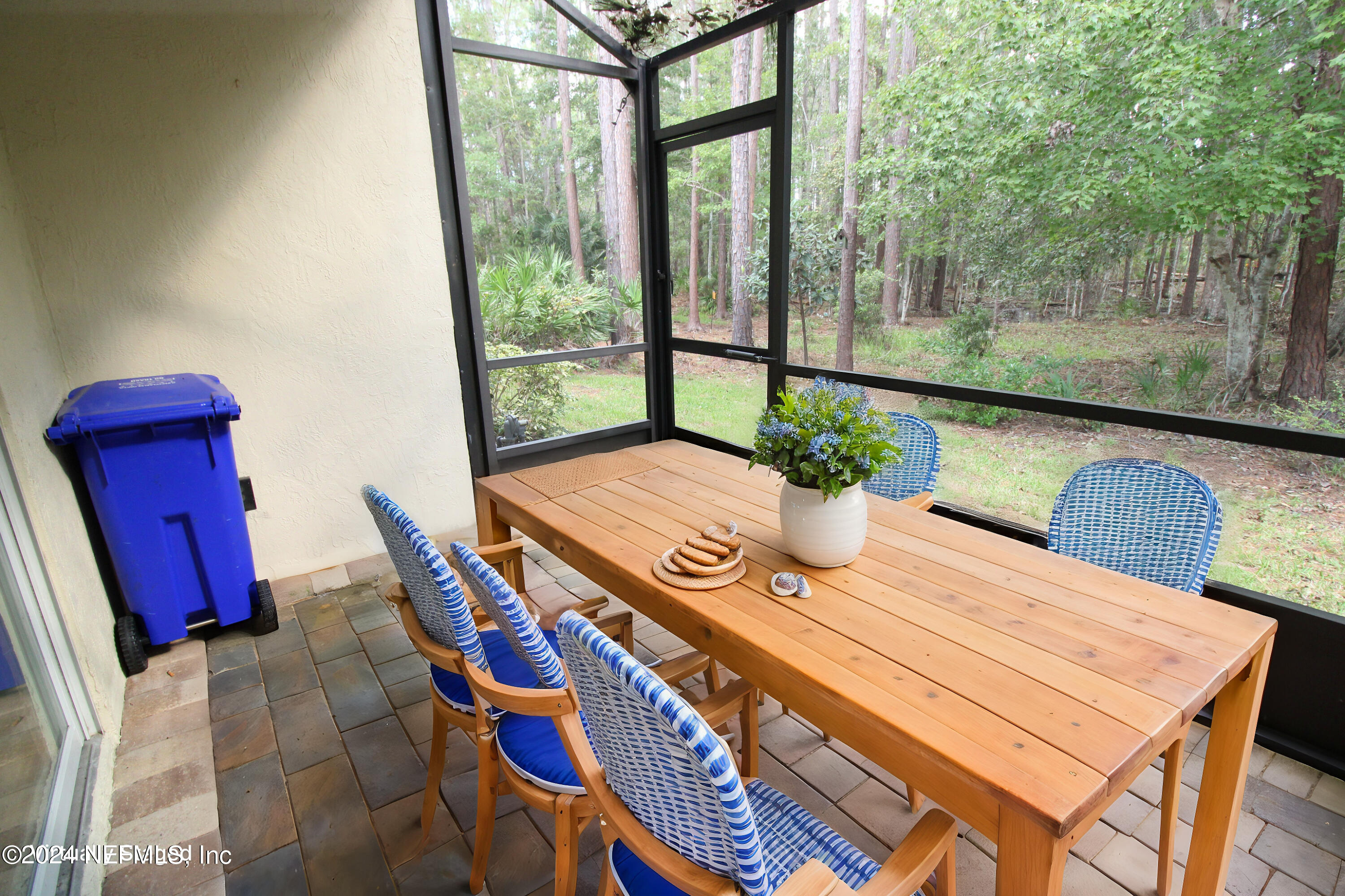 28 Grand Ravine Drive St. Augustine, FL 32086 - Photo 41 of 55 a view of a dining room with furniture a chandelier and wooden floor