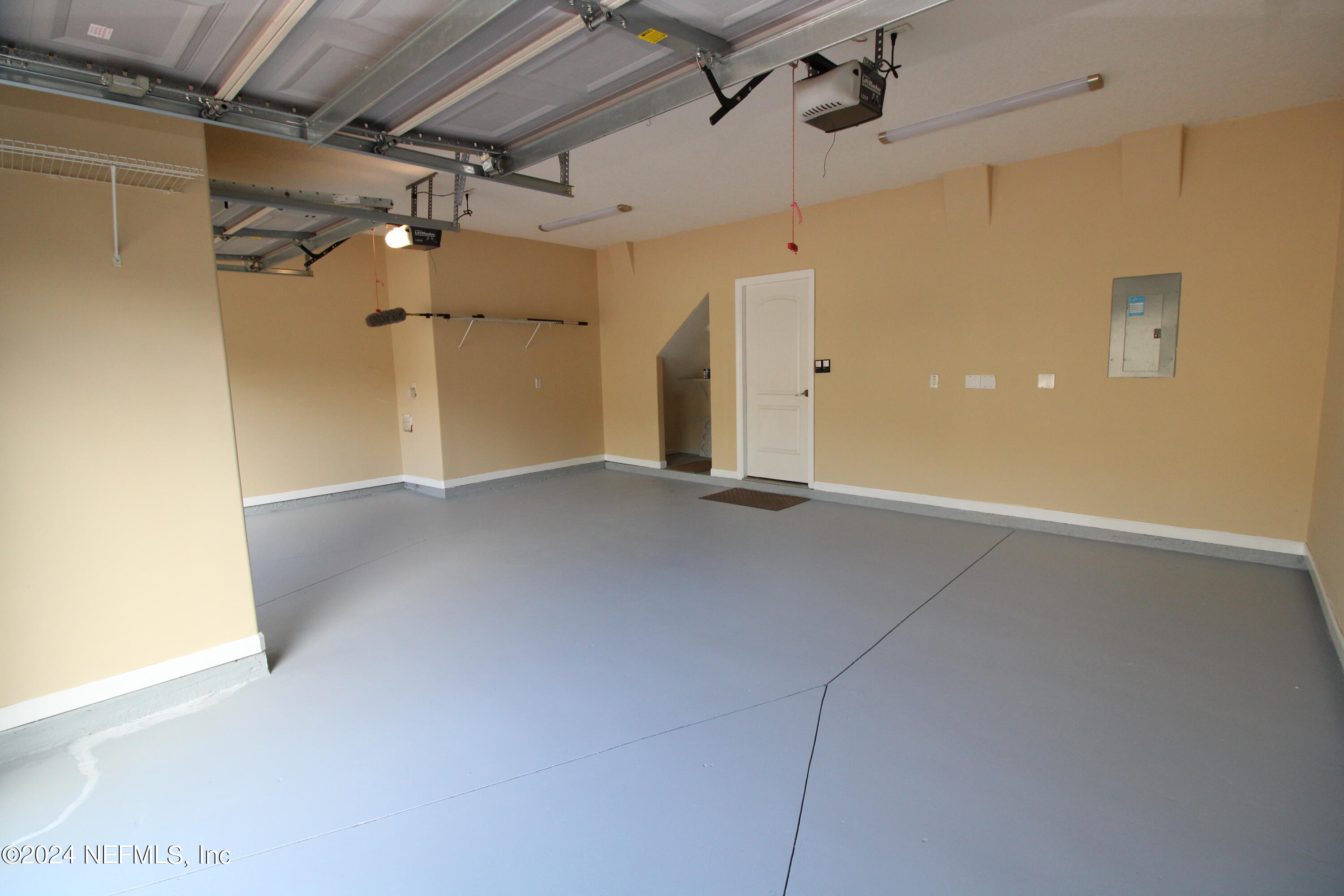 28 Grand Ravine Drive St. Augustine, FL 32086 - Photo 48 of 55 a view of a big room with a garage