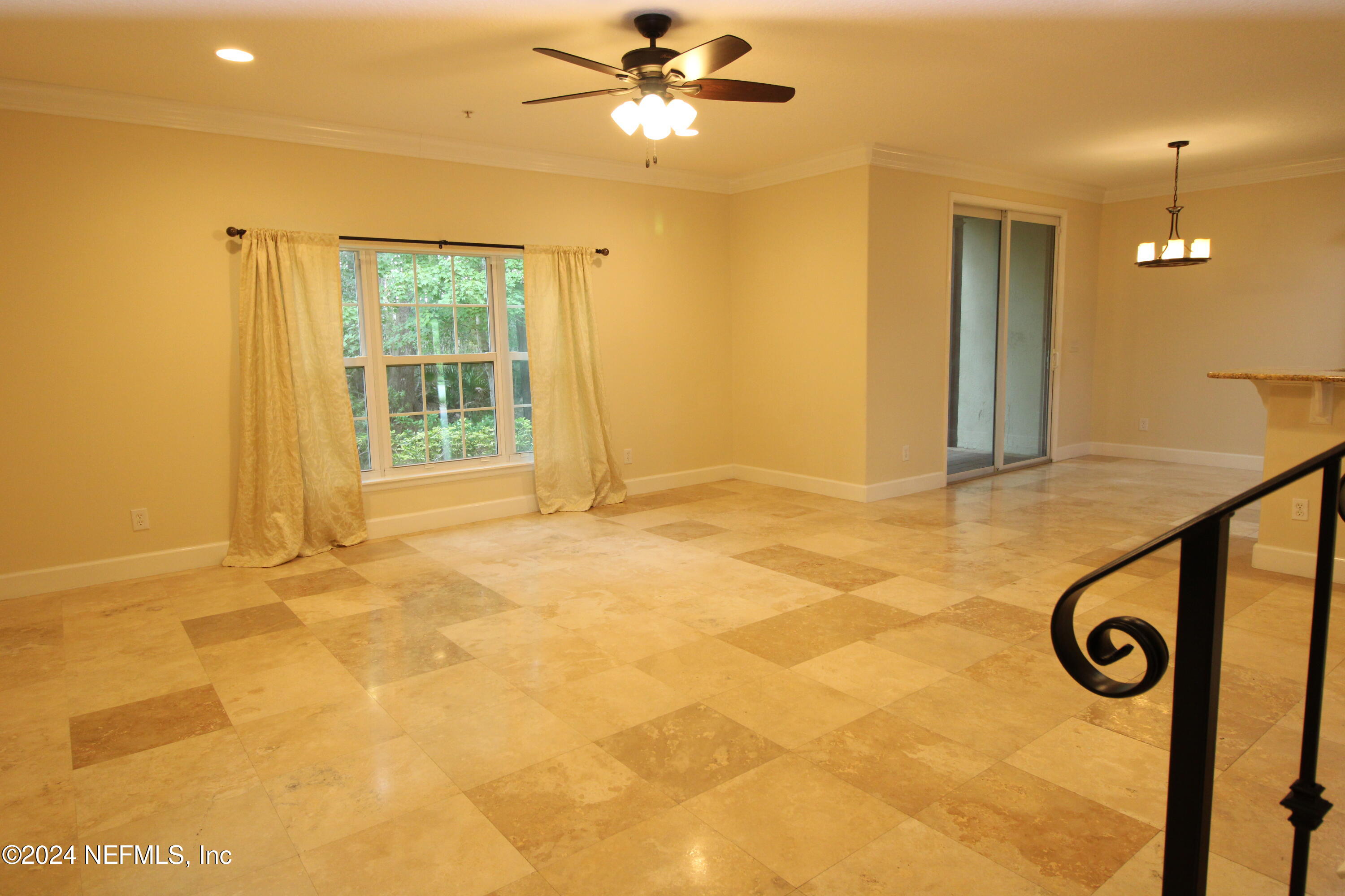 28 Grand Ravine Drive St. Augustine, FL 32086 - Photo 6 of 55 a view of a livingroom with a furniture and an window