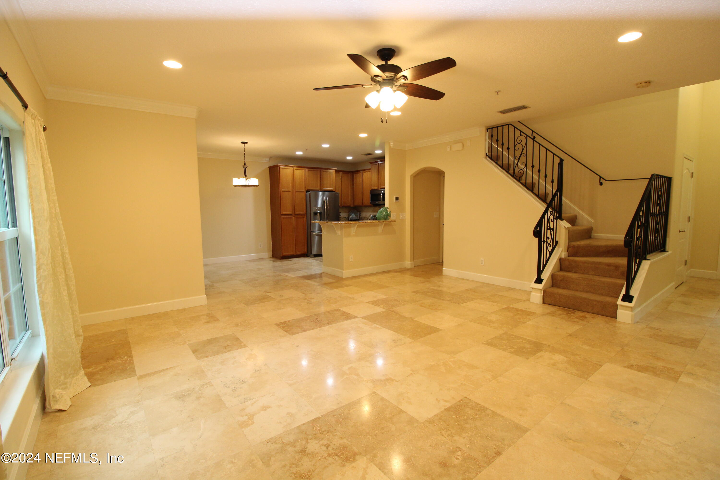 28 Grand Ravine Drive St. Augustine, FL 32086 - Photo 10 of 55 a view of a livingroom with a furniture and staircase