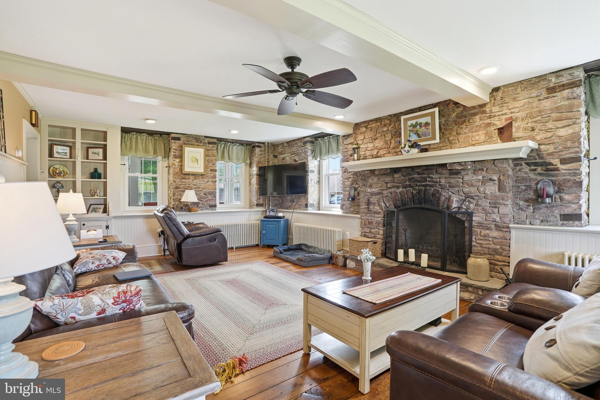 572 Halteman Road Souderton, PA 18964 - Photo 12 of 81 Living room with stone fire place