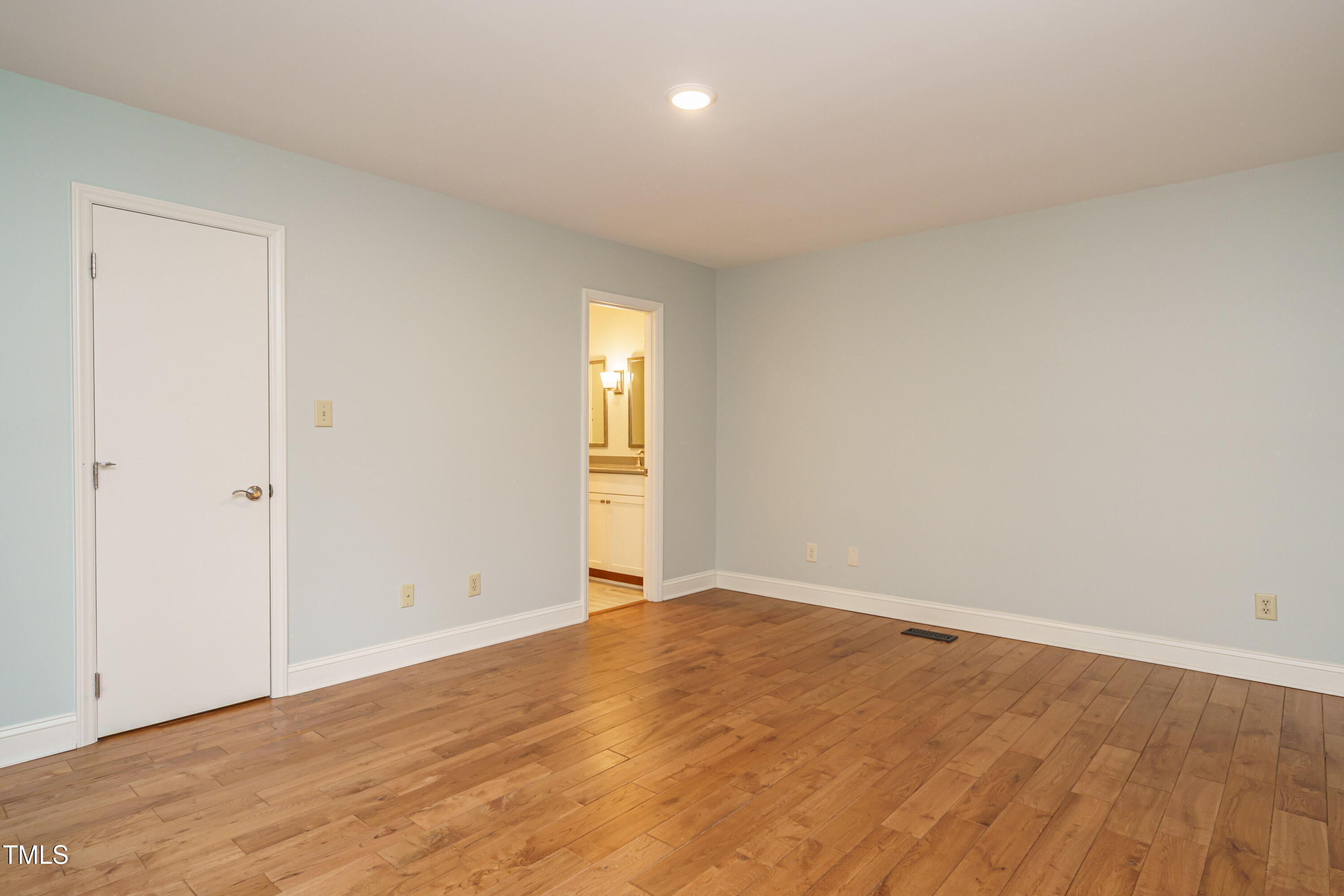 2916 Rue Sans Famille Raleigh, NC 27607 - Photo 28 of 32 wooden floor in an empty room