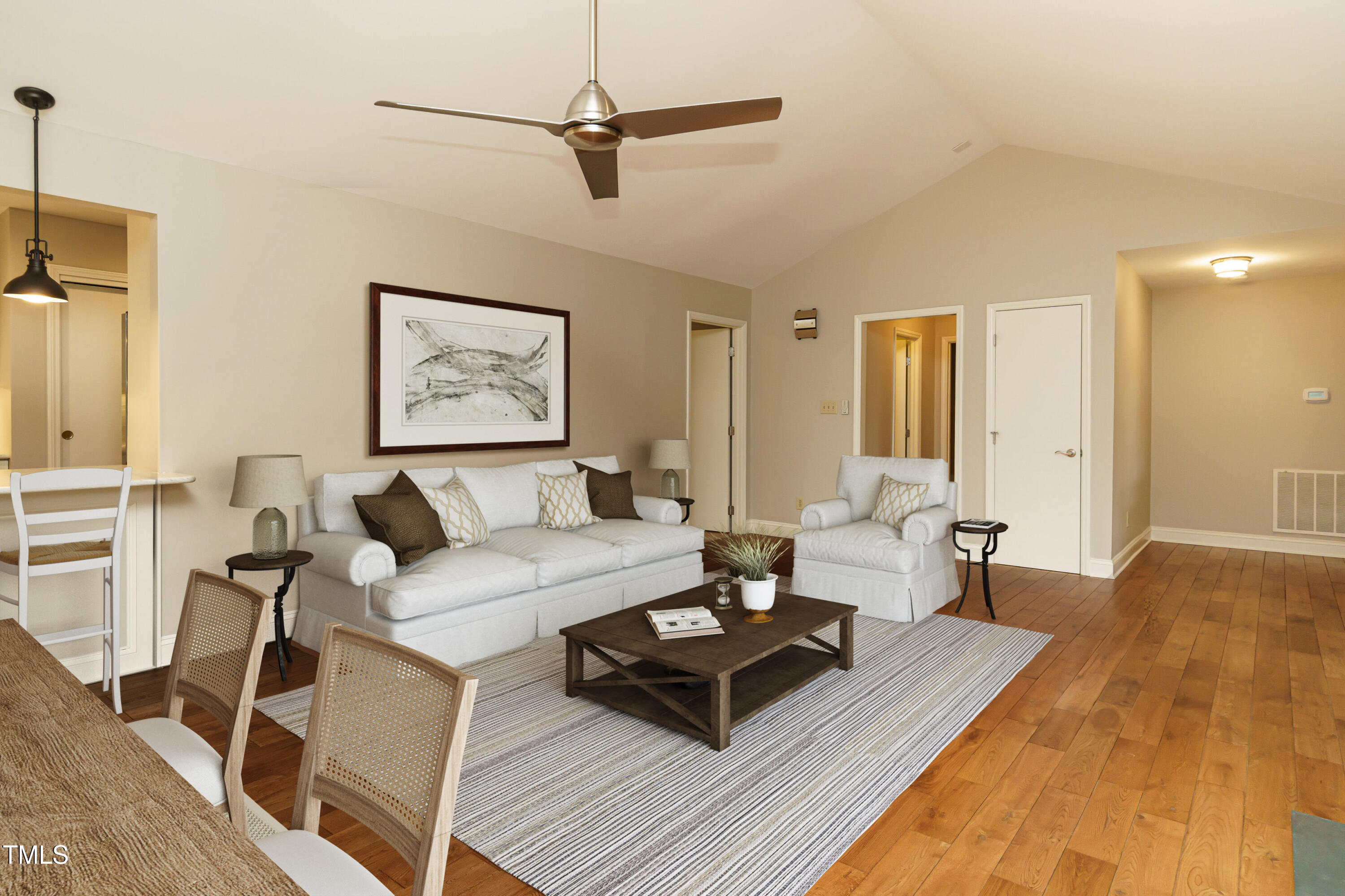 2916 Rue Sans Famille Raleigh, NC 27607 - Photo 5 of 32 a living room with furniture and a rug