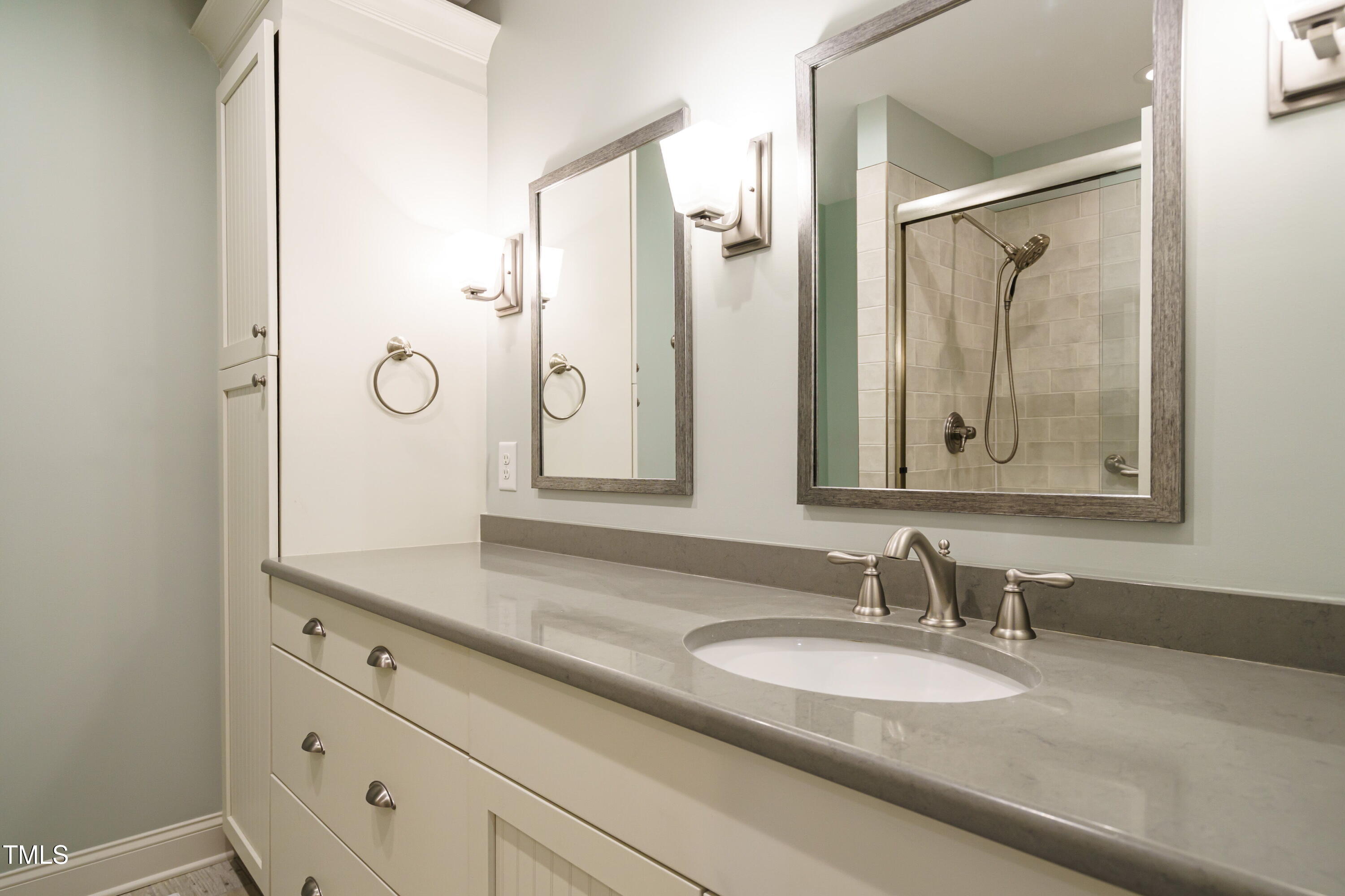 2916 Rue Sans Famille Raleigh, NC 27607 - Photo 8 of 32 a bathroom with a granite countertop sink mirror and double