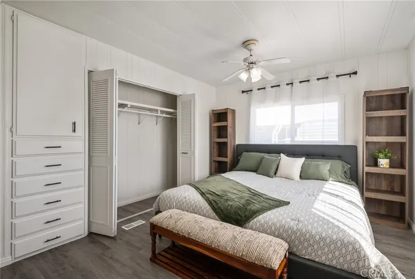 a bed room with a bed and a window