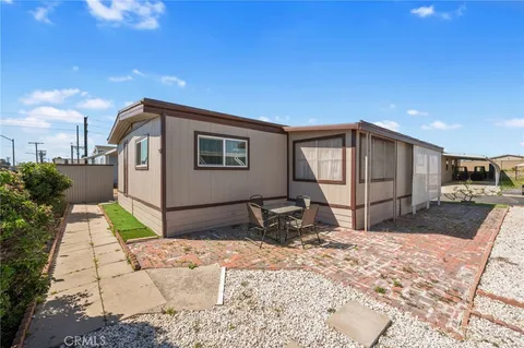 a house view with a backyard space
