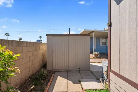 a balcony view with a potted plant