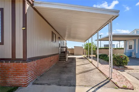 a view of a porch with wooden floor