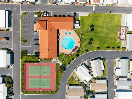 an aerial view of a house with swimming pool