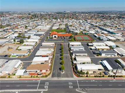 a view of a swimming pool with a lounge chair