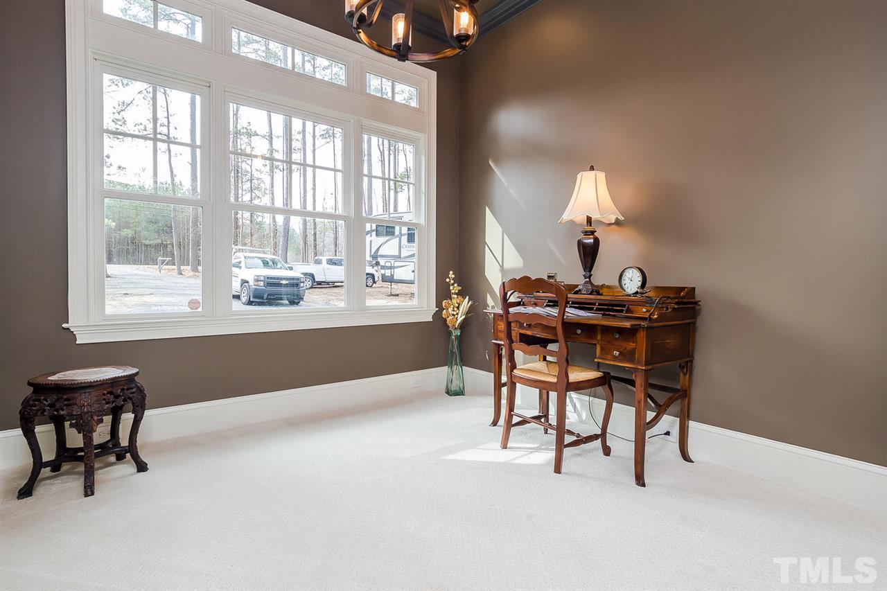 5006 Redwood Road Durham, NC 27704 - Photo 8 of 25 a workspace with furniture and window
