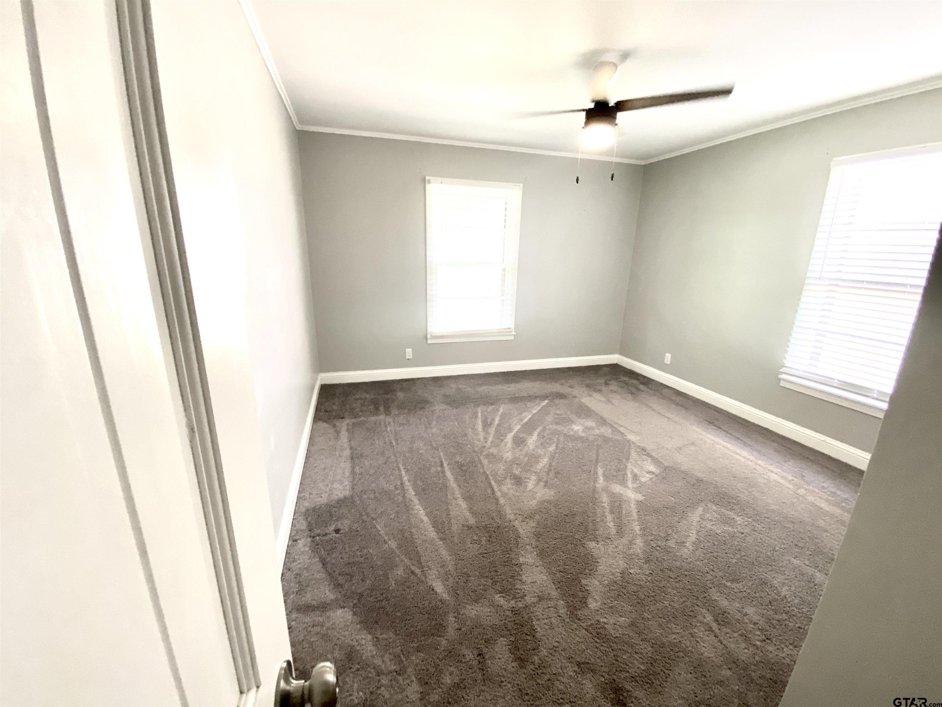 1914 Parklen Street Tyler, TX 75701 - Photo 22 of 39 a view of room with window and hardwood floor