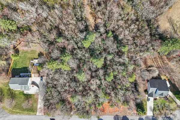 an aerial view of residential house with outdoor space