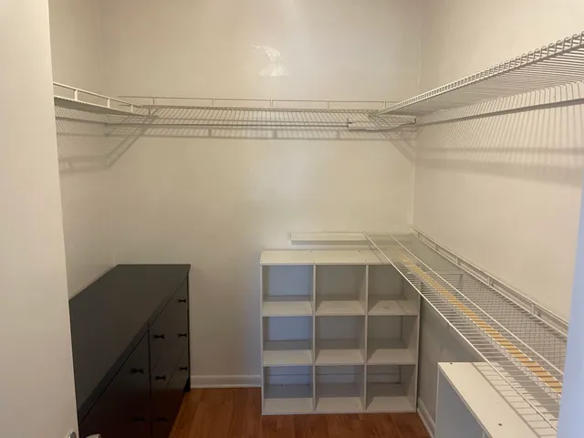 a view of an empty walk in closet
