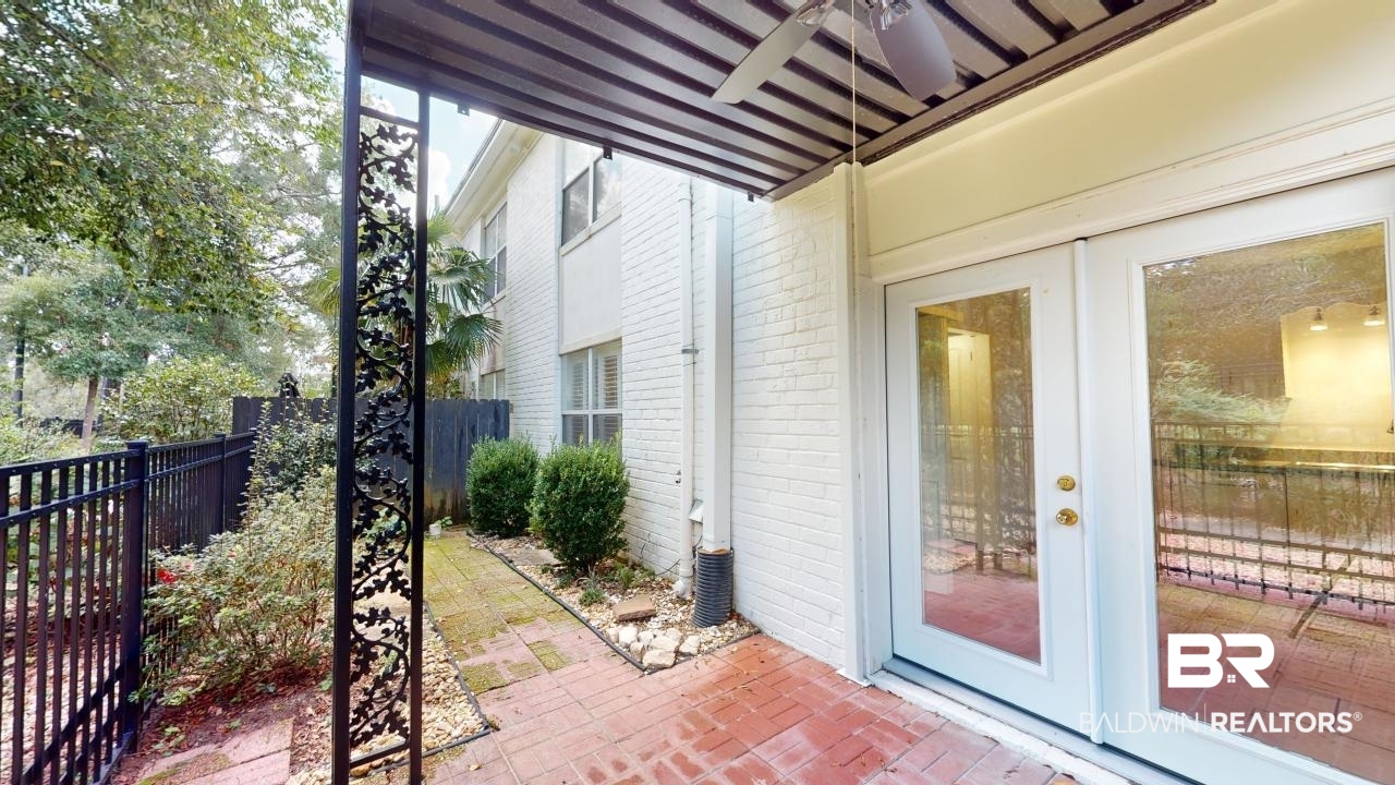 4009 Old Shell Road, Unit C13 Mobile, AL 36608 - Photo 22 of 32 View of patio with french doors and ceiling fan