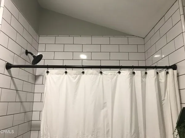 a bathroom with a sink a toilet and vanity