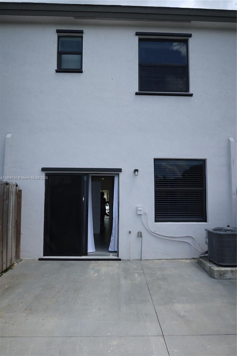 18240 Southwest 148th Road, Unit 18240 Miami, FL 33187 - Photo 13 of 30 a view of outdoor space