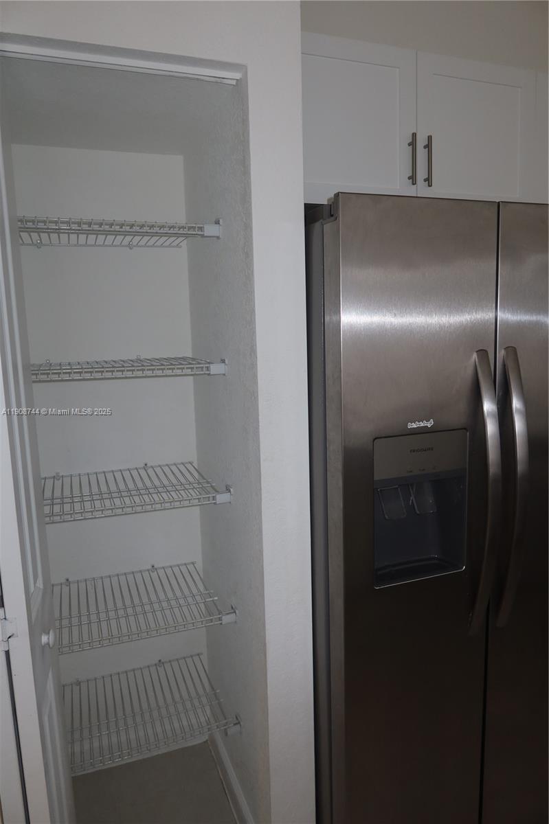 18240 Southwest 148th Road, Unit 18240 Miami, FL 33187 - Photo 5 of 30 a bathroom with a glass door shower