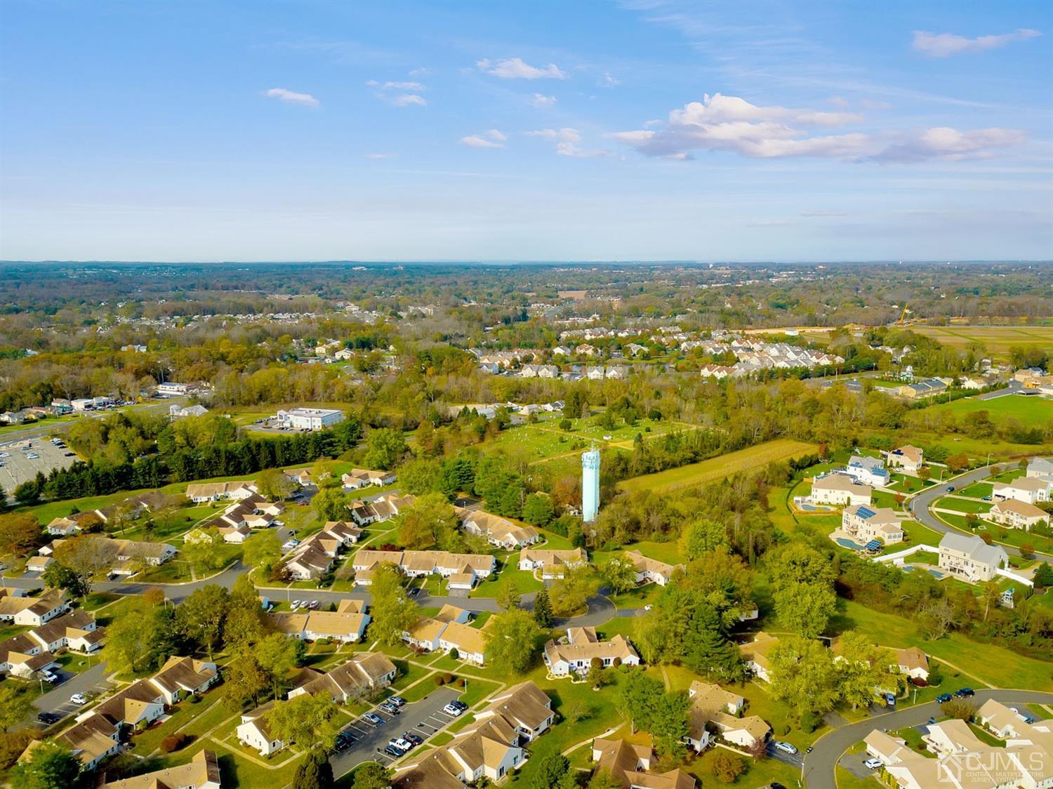 136 Rigi Strasse, Unit E Freehold, NJ 07728 - Photo 28 of 30 a view of city and ocean