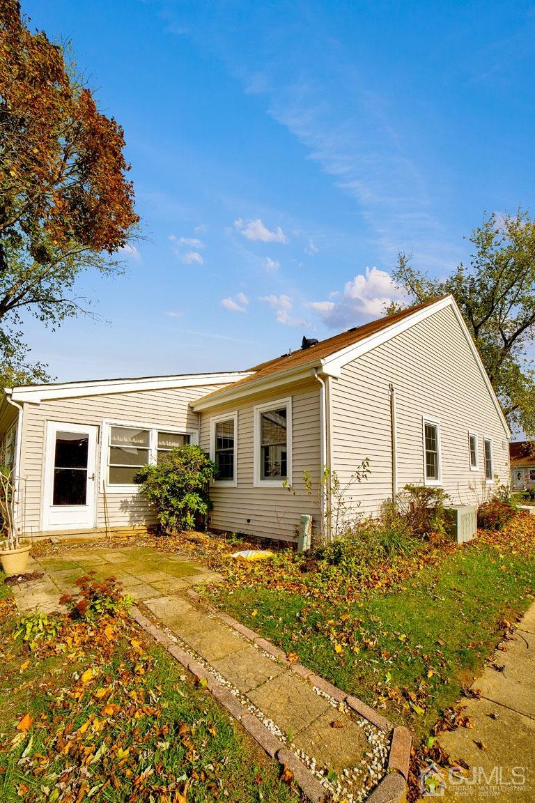 136 Rigi Strasse, Unit E Freehold, NJ 07728 - Photo 6 of 30 a front view of house with yard