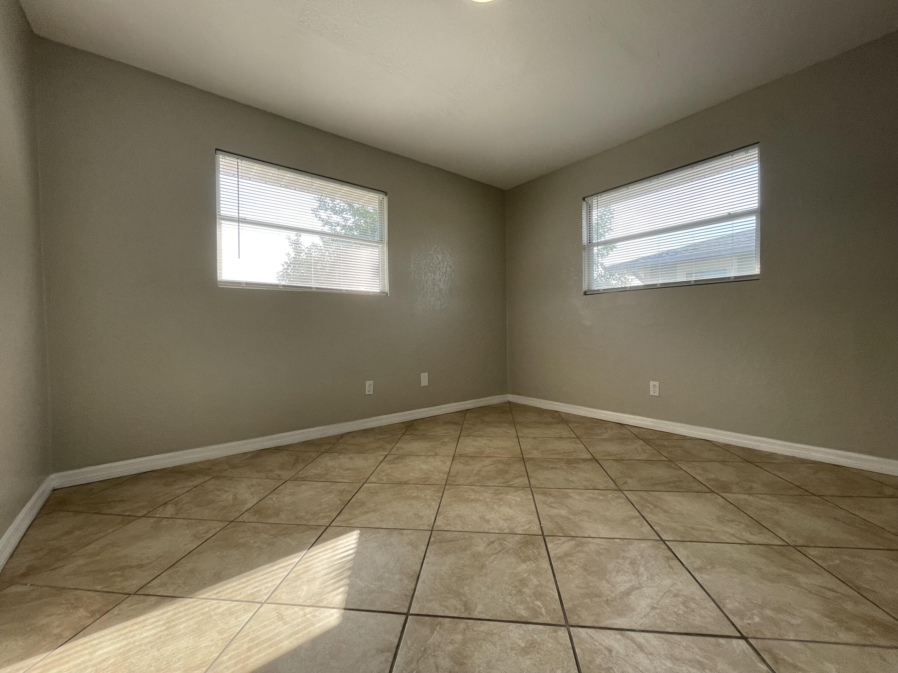 2880 Harson Way Fort Pierce, FL 34946 - Photo 35 of 40 a view of an empty room with a window