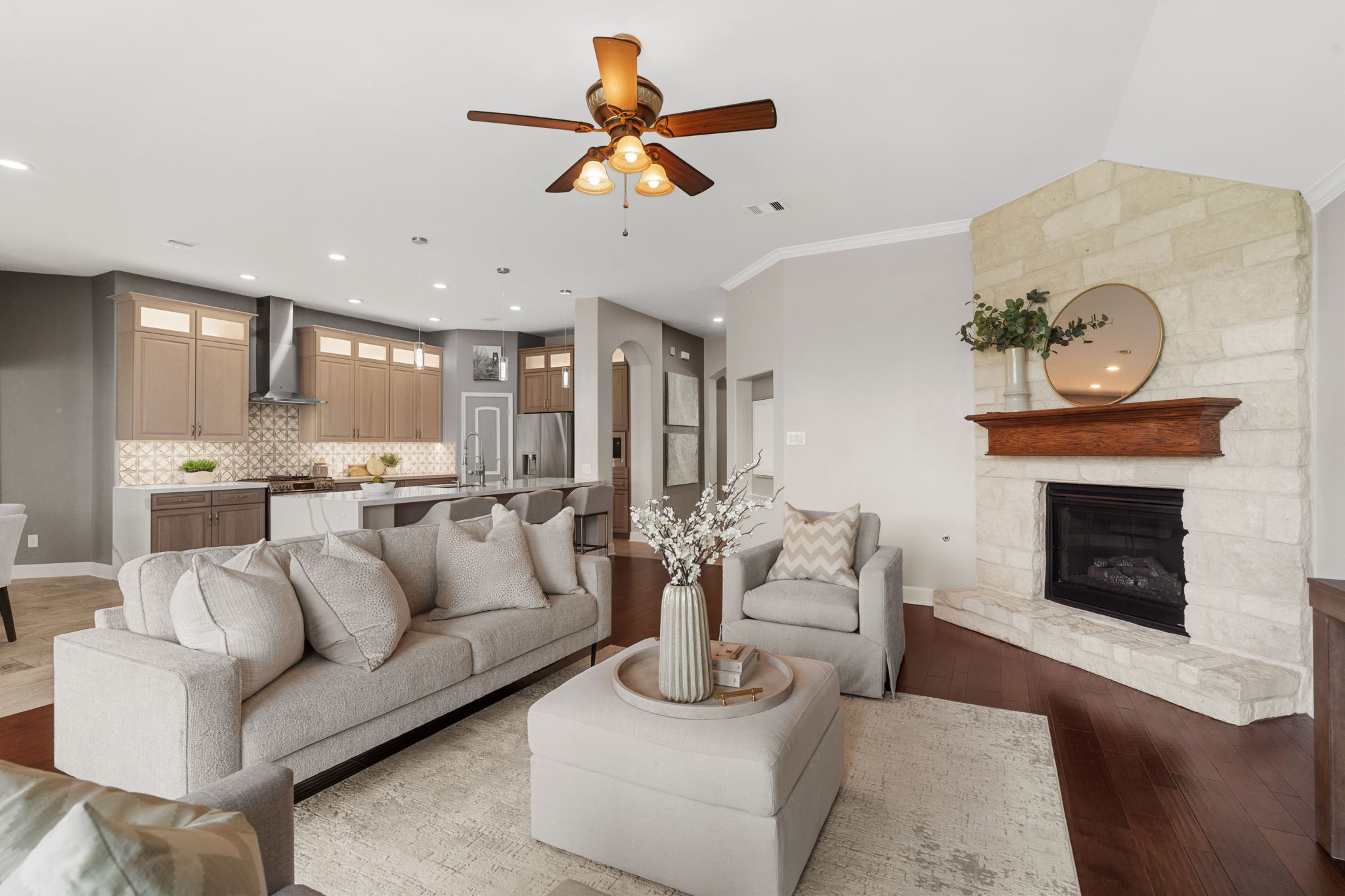 3426 Summer Ranch Drive Katy, TX 77494 - Photo 12 of 48 Another view of the family room highlights its generous proportions, warm finishes, and inviting ambiance centered around a beautiful fireplace.