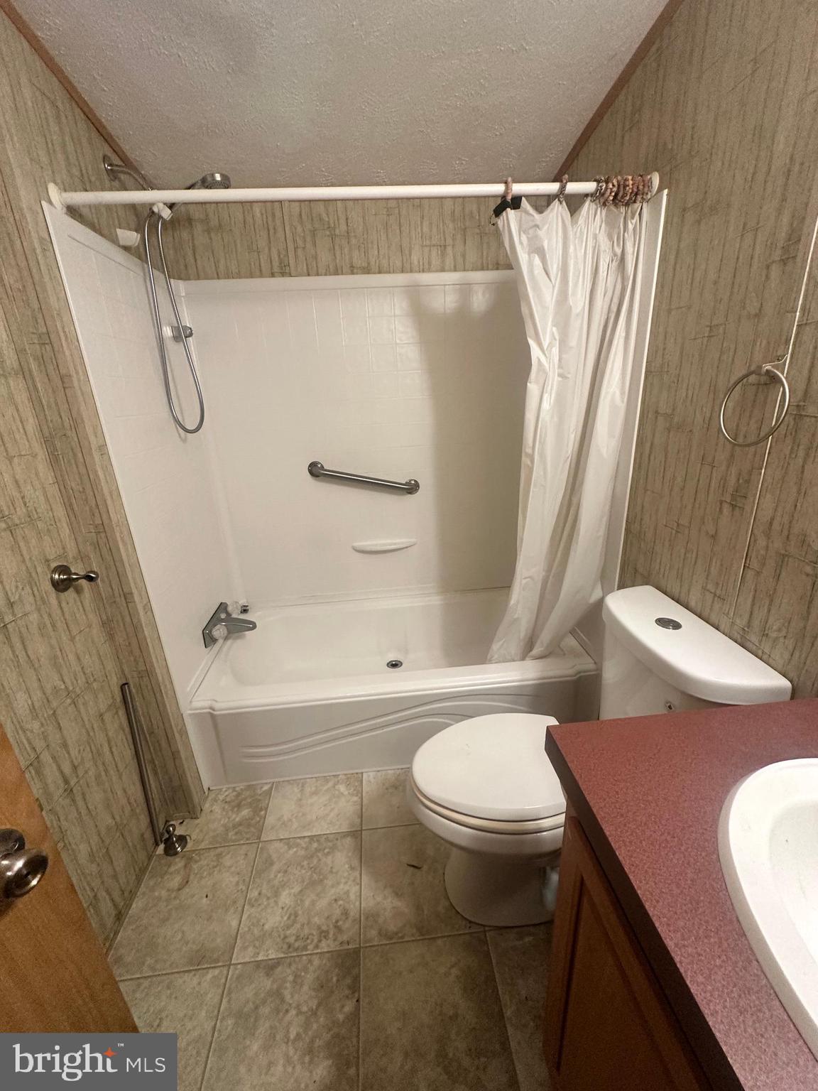 35390 Heron Road Millsboro, DE 19966 - Photo 17 of 25 a bathroom with a sink and a toilet