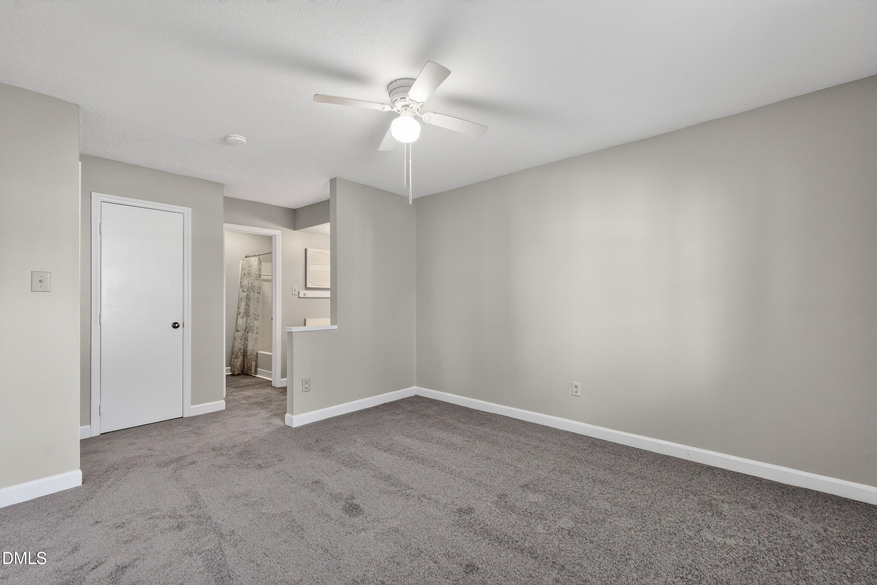 2510 Avent Ferry Road, Unit 104 Raleigh, NC 27606 - Photo 15 of 26 a view of an empty room with a fan