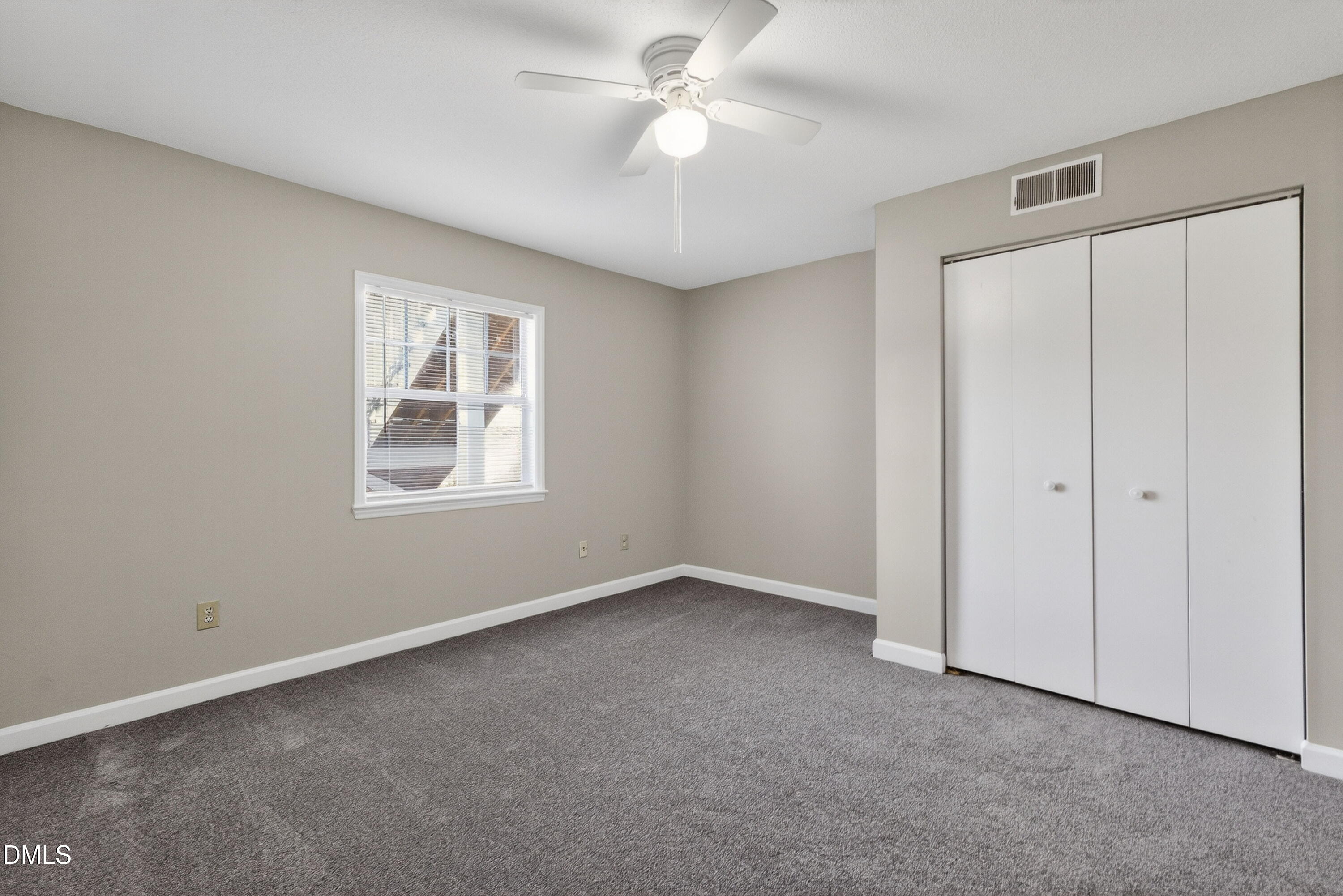 2510 Avent Ferry Road, Unit 104 Raleigh, NC 27606 - Photo 16 of 26 a view of an empty room with a window