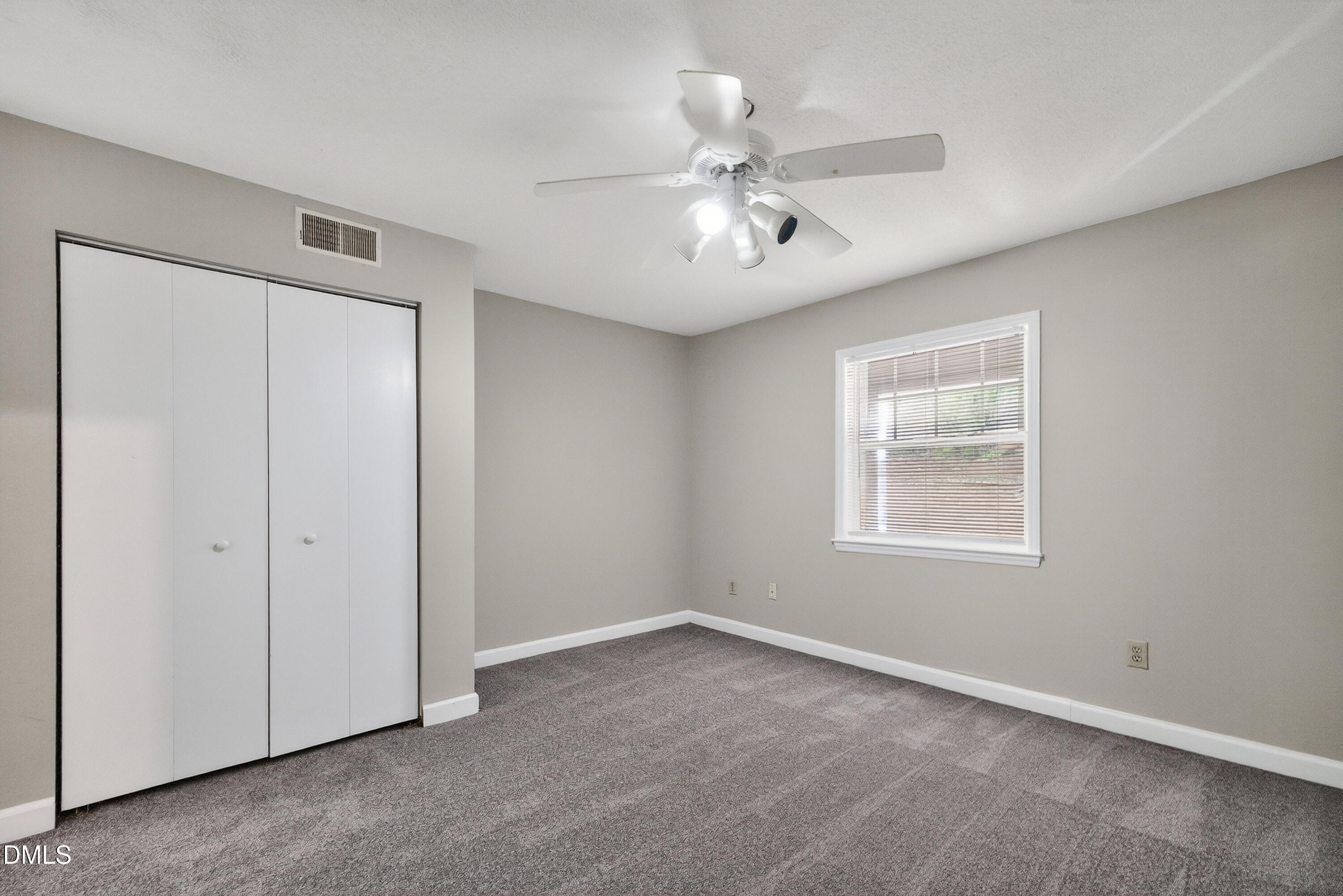 2510 Avent Ferry Road, Unit 104 Raleigh, NC 27606 - Photo 20 of 26 a view of an empty room with a window