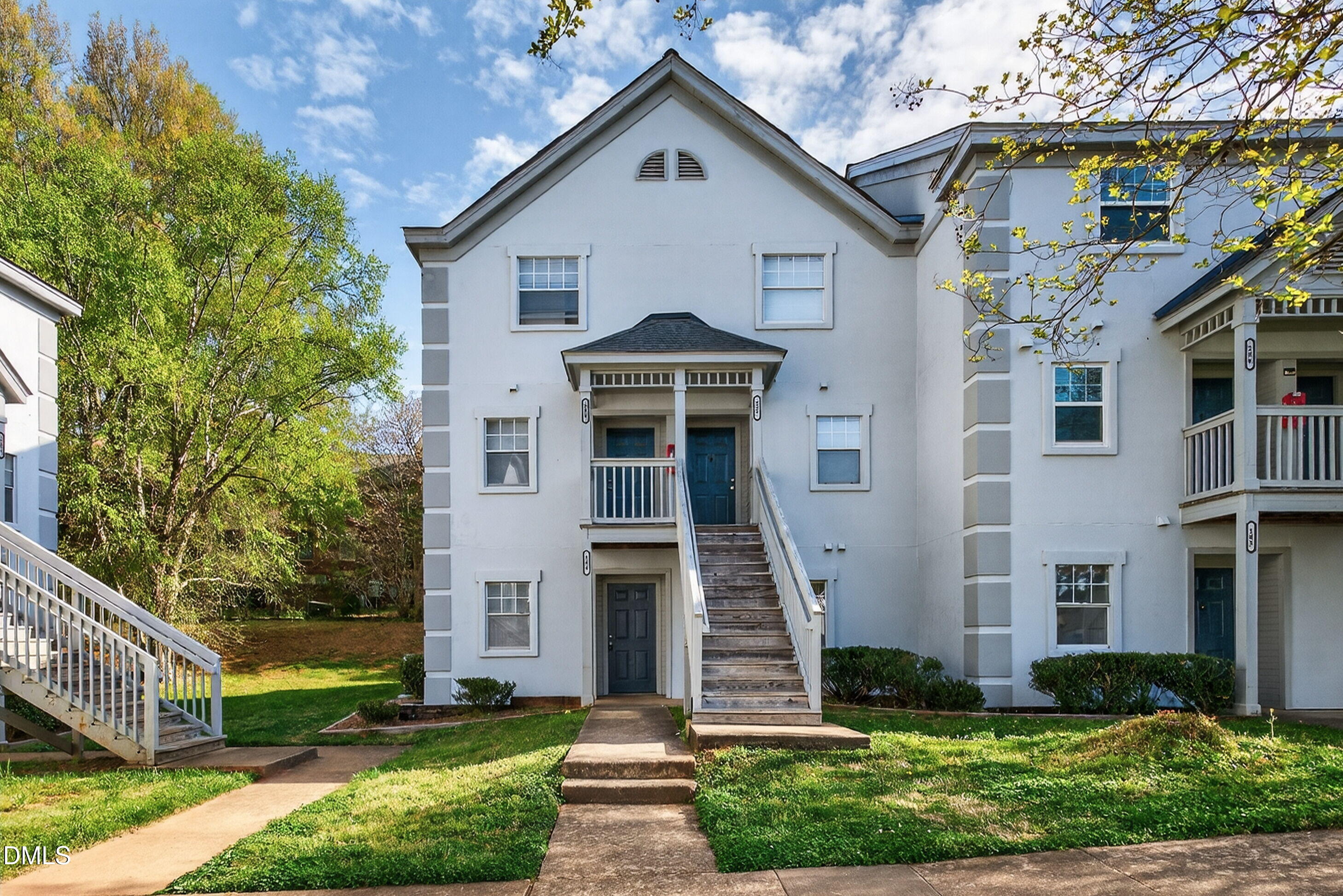 2510 Avent Ferry Road, Unit 104 Raleigh, NC 27606 - Photo 25 of 26 a front view of a house with a yard