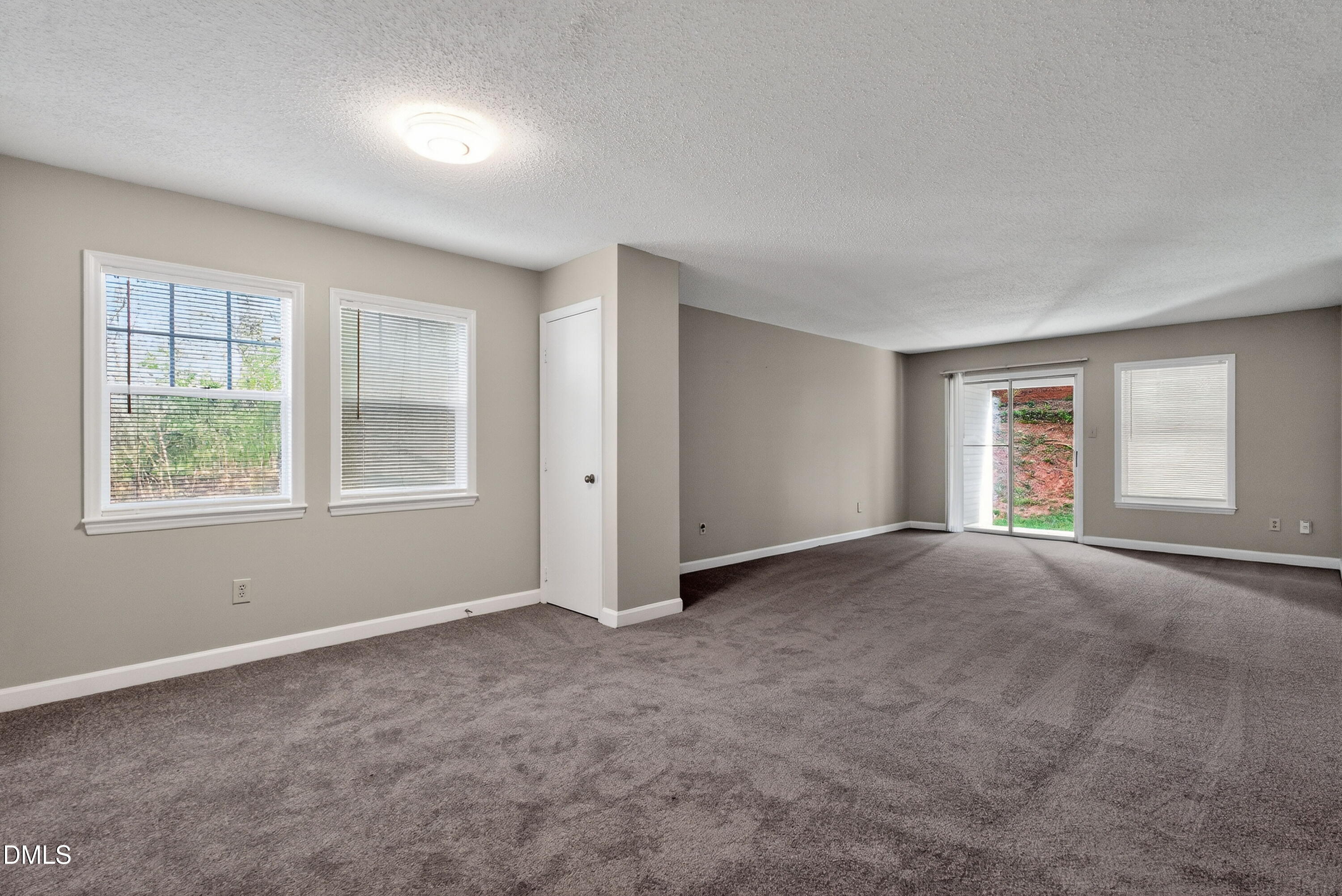 2510 Avent Ferry Road, Unit 104 Raleigh, NC 27606 - Photo 5 of 26 an empty room with windows