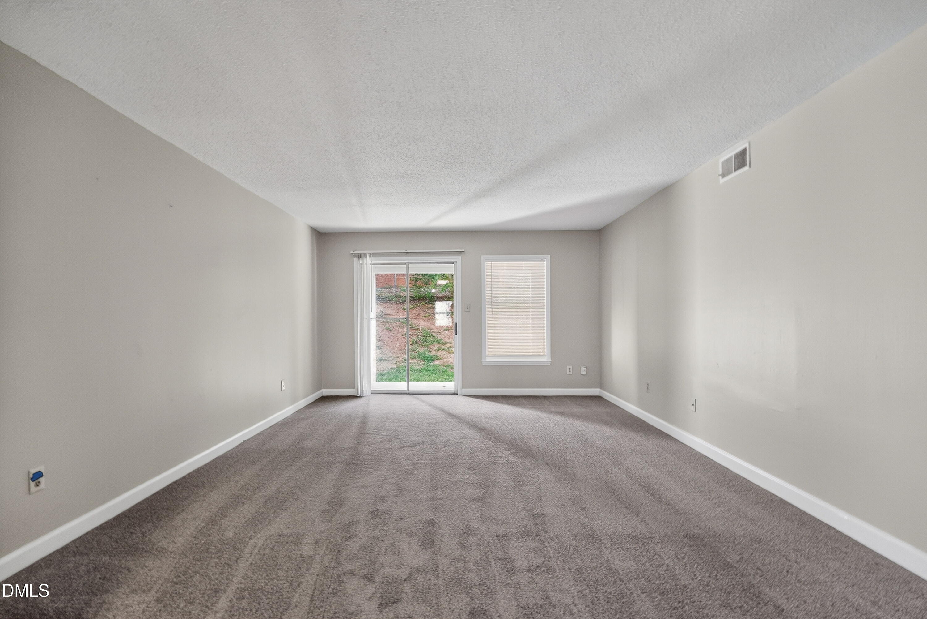 2510 Avent Ferry Road, Unit 104 Raleigh, NC 27606 - Photo 8 of 26 a view of an empty room with a window