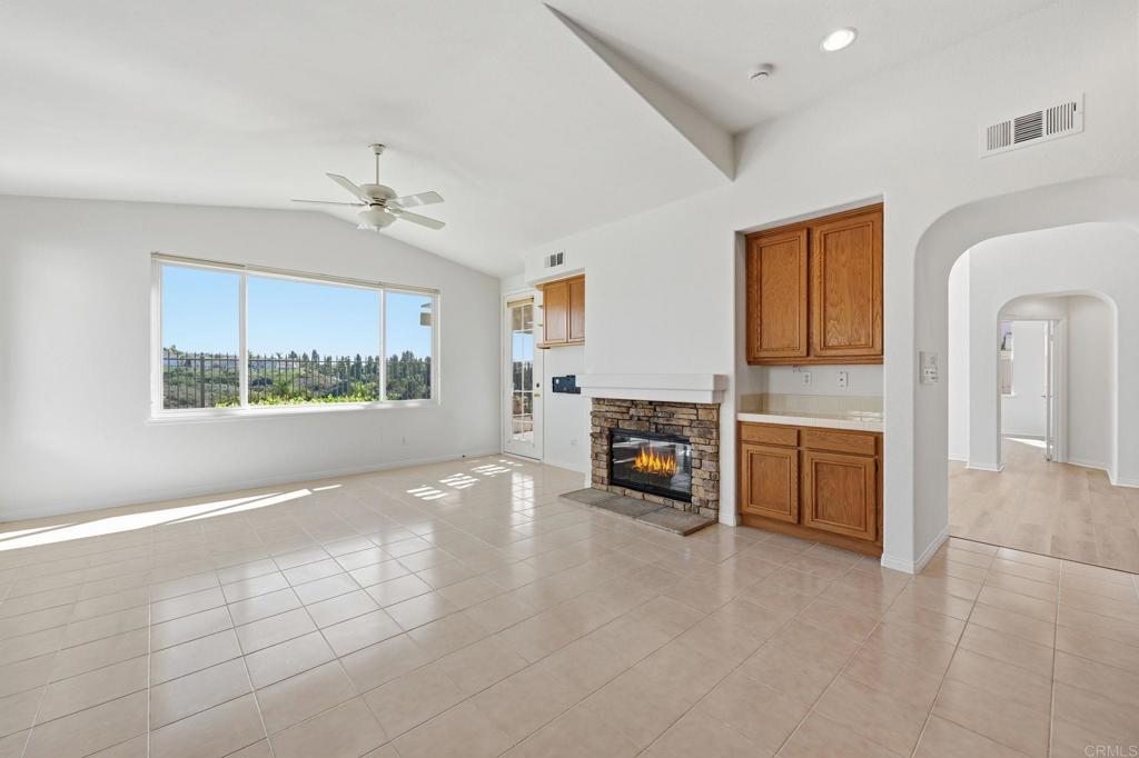 1359 Sparrow Road Carlsbad, CA 92011 - Photo 17 of 43 a view of a livingroom with a fireplace and window