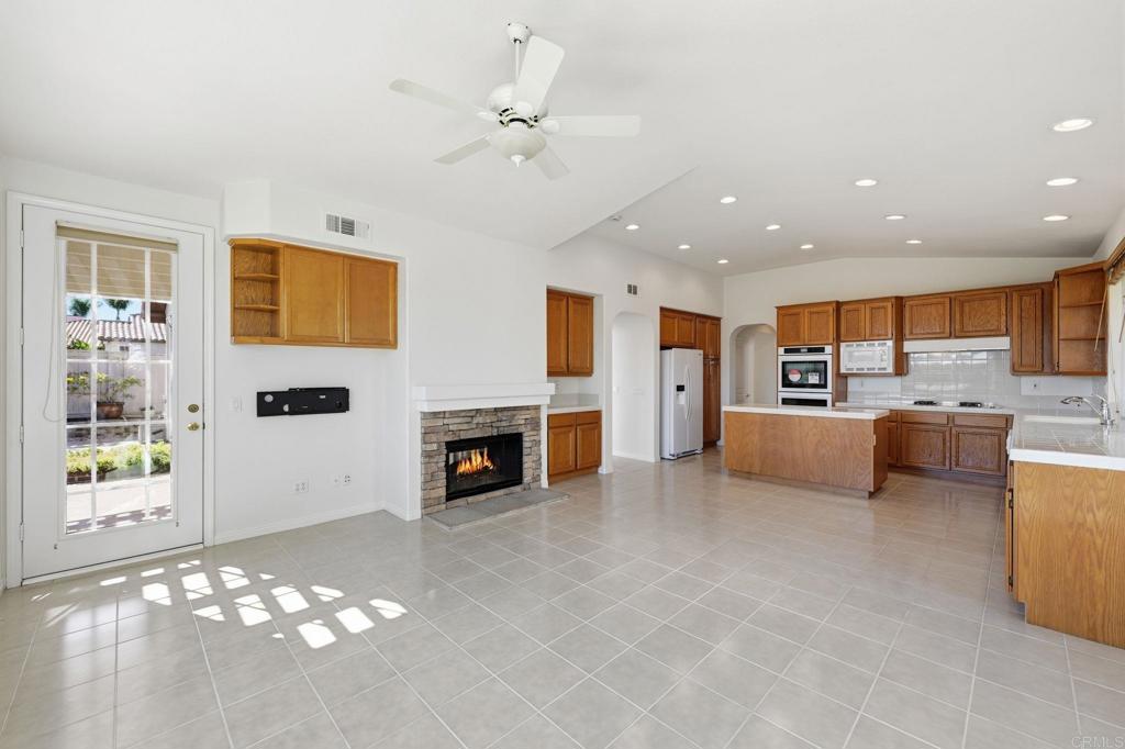 1359 Sparrow Road Carlsbad, CA 92011 - Photo 19 of 43 a view of a livingroom with furniture and a kitchen
