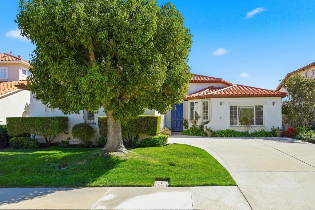 1359 Sparrow Road Carlsbad, CA 92011 - Photo 2 of 43 a front view of house with a garden